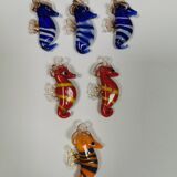 Six small Murano Seahorses in glass.
