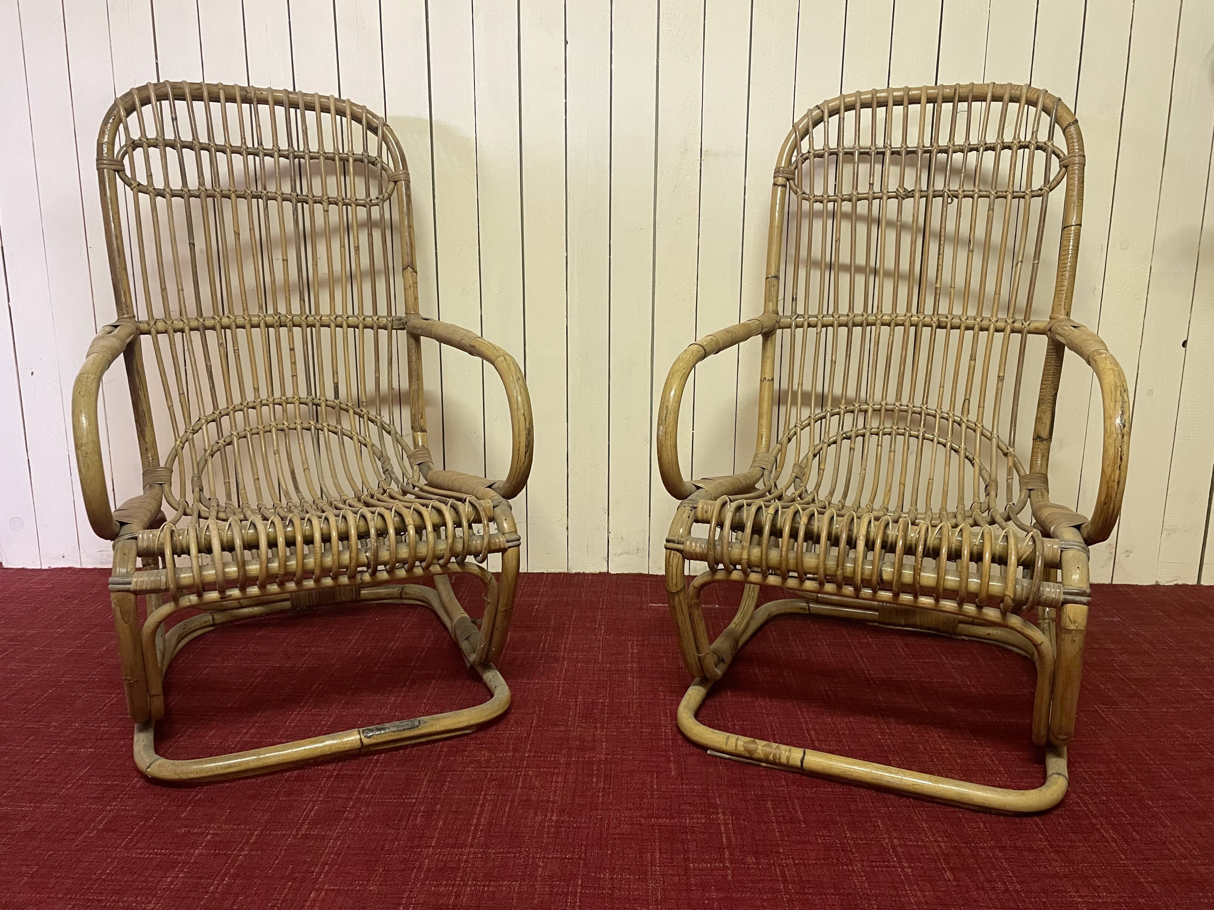 Pair of vintage rattan armchairs, Italy 1950