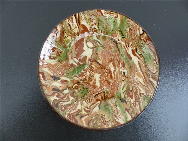 Apt earthenware coffee cup