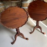 A pair of reclining side tables.