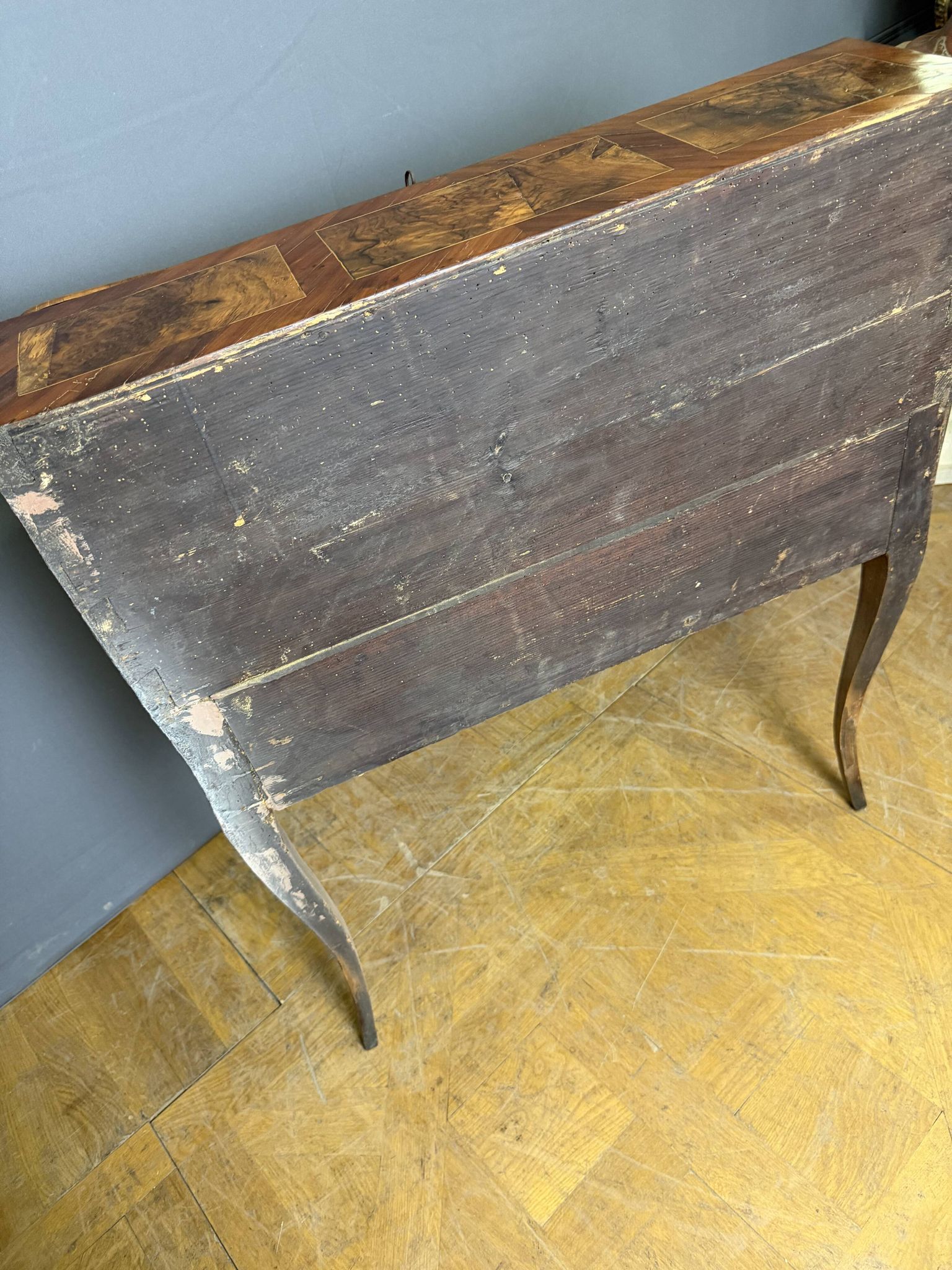 Louis XV slant-top desk in 18th-century marquetry.