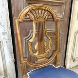 Paire de chaises style Louis XVI en bois doré