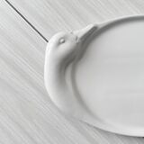 Porcelain goose serving dish.