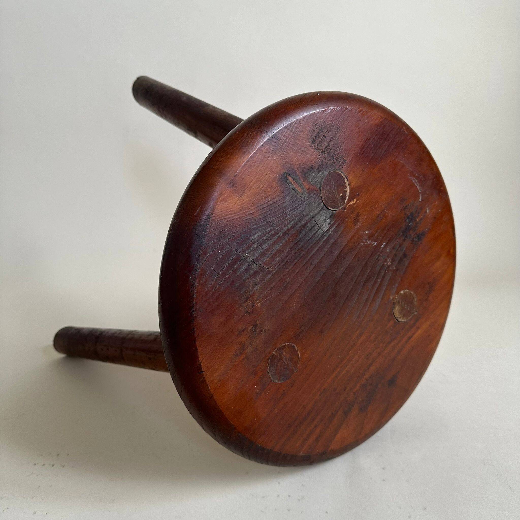Wooden tripod stool