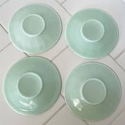 Set of 4 mint green opaline saucers with a swirl pattern, made in France.