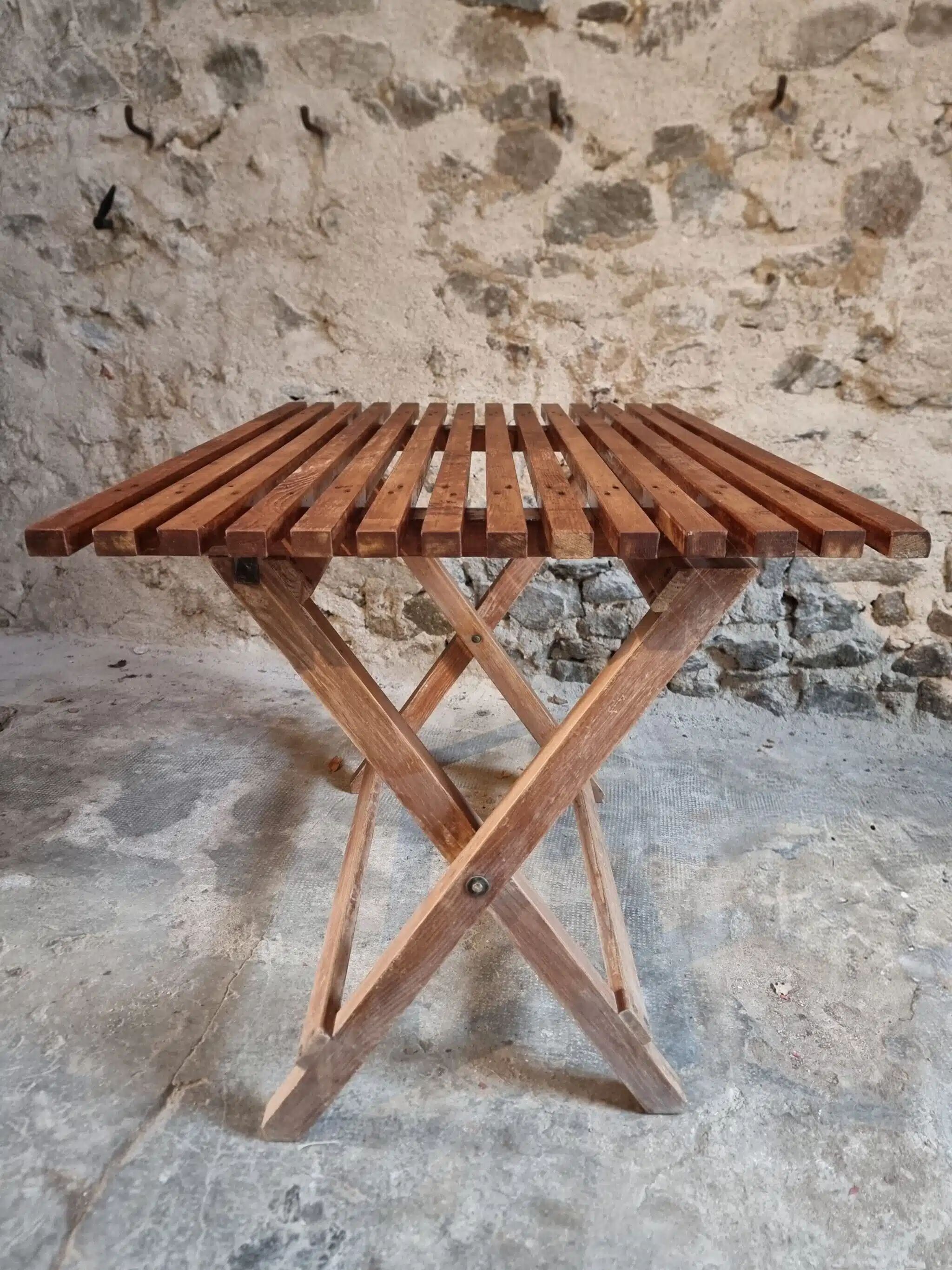Vintage folding garden table in pine, mid-20th century.