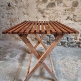 Vintage folding garden table in pine, mid-20th century.