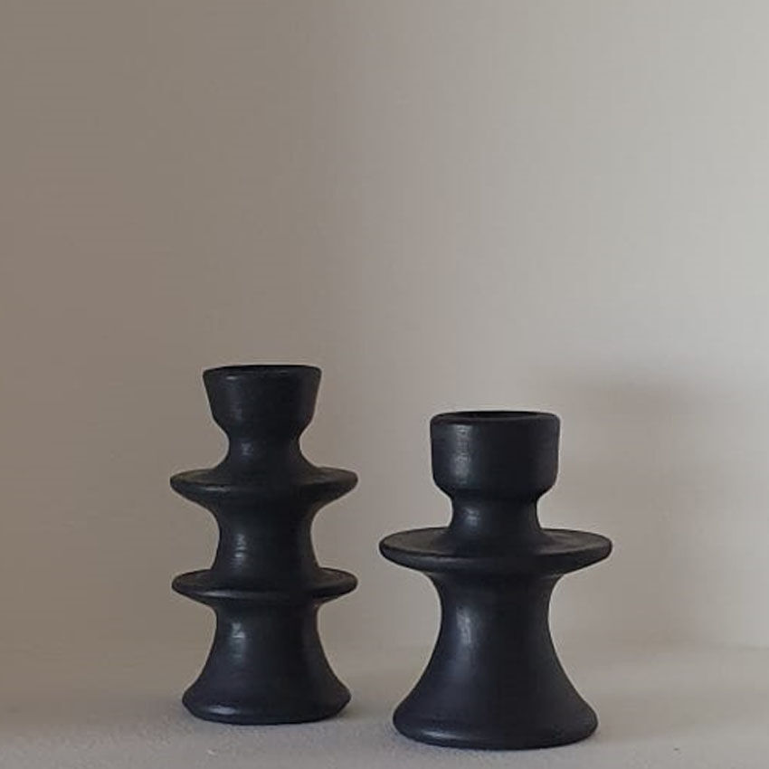 Set of two candlesticks in black tadelakt