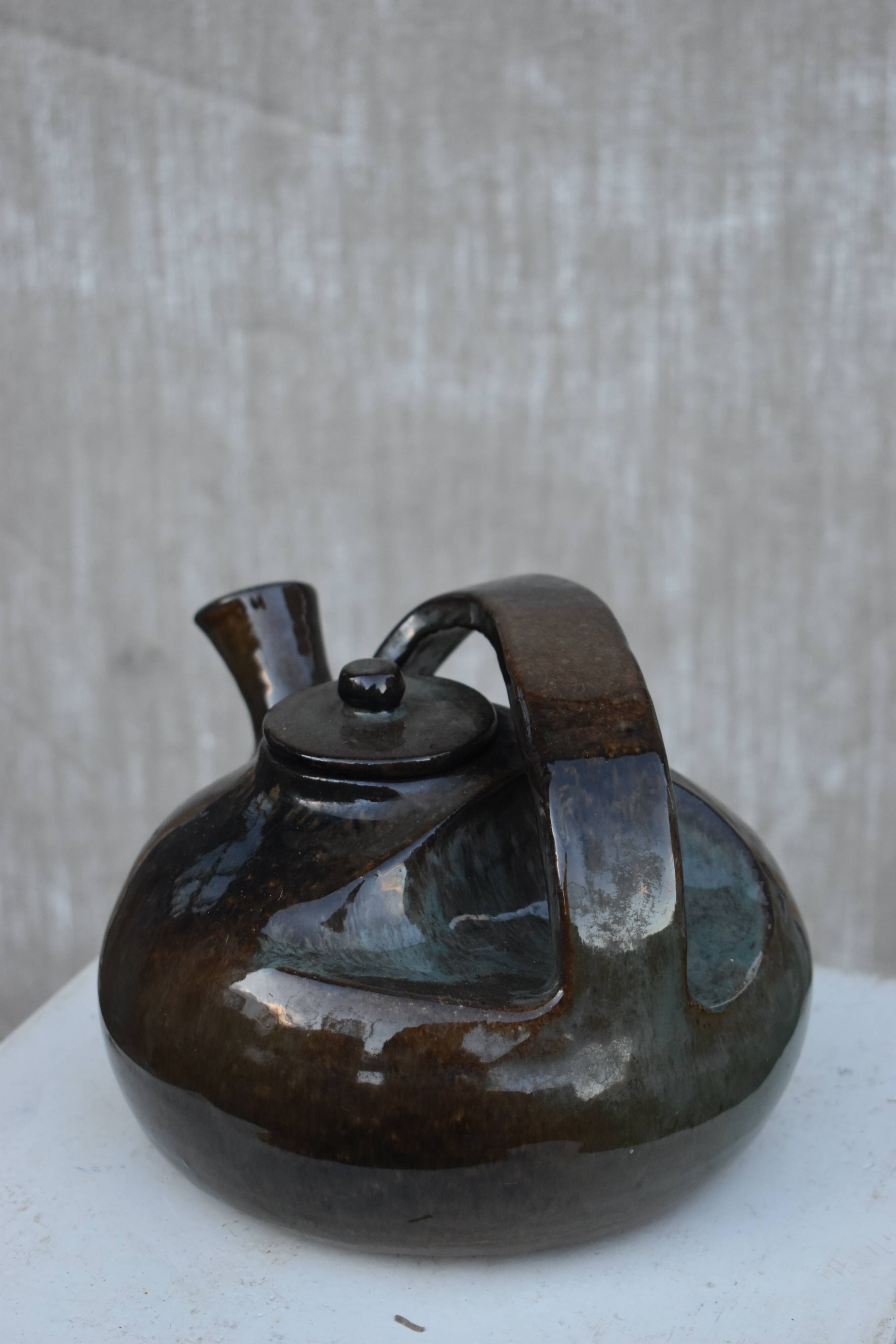 Glazed terracotta teapot