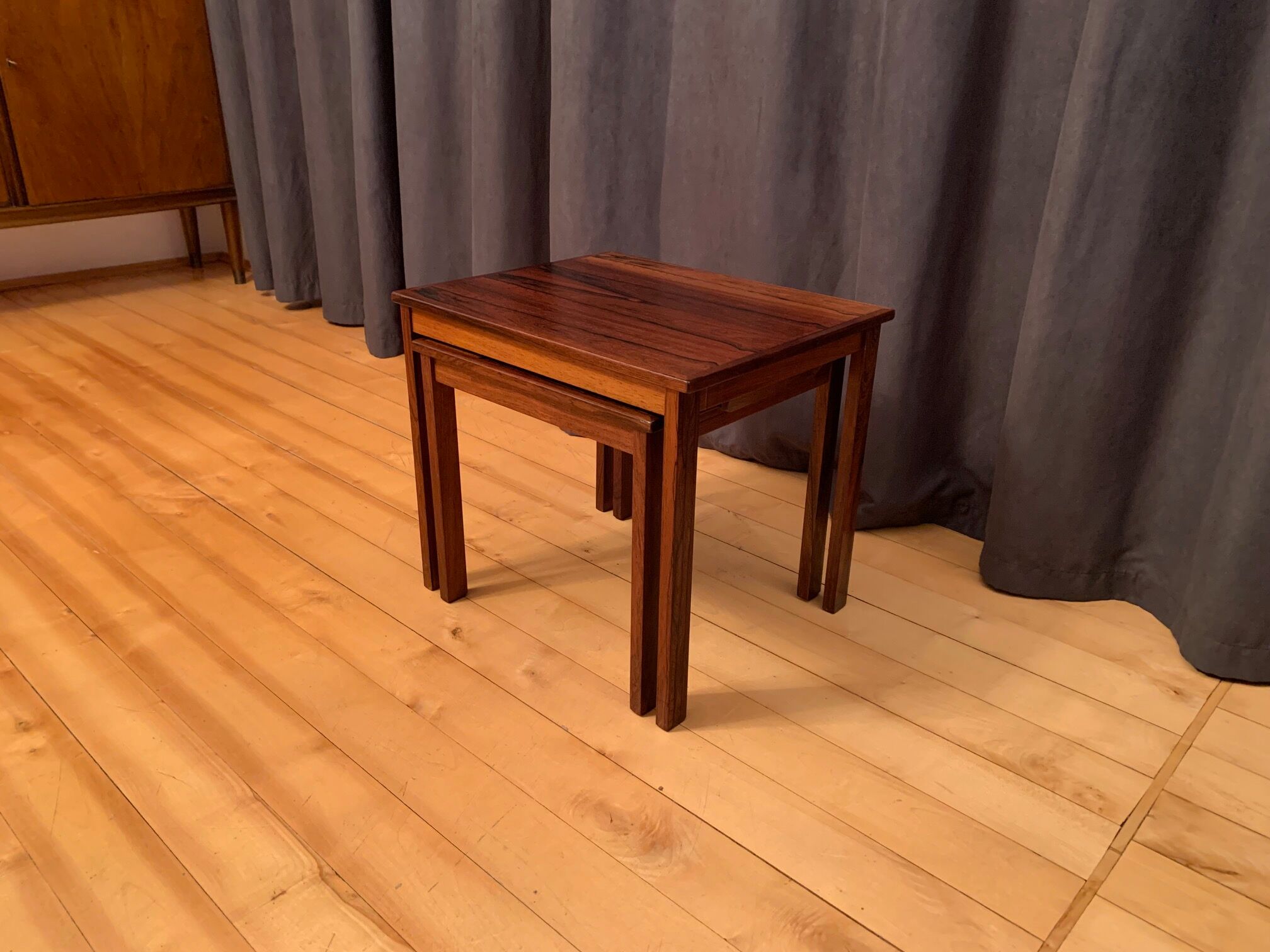 A pair of Kvalitet Form Funktion rosewood side tables Denmark 1960s