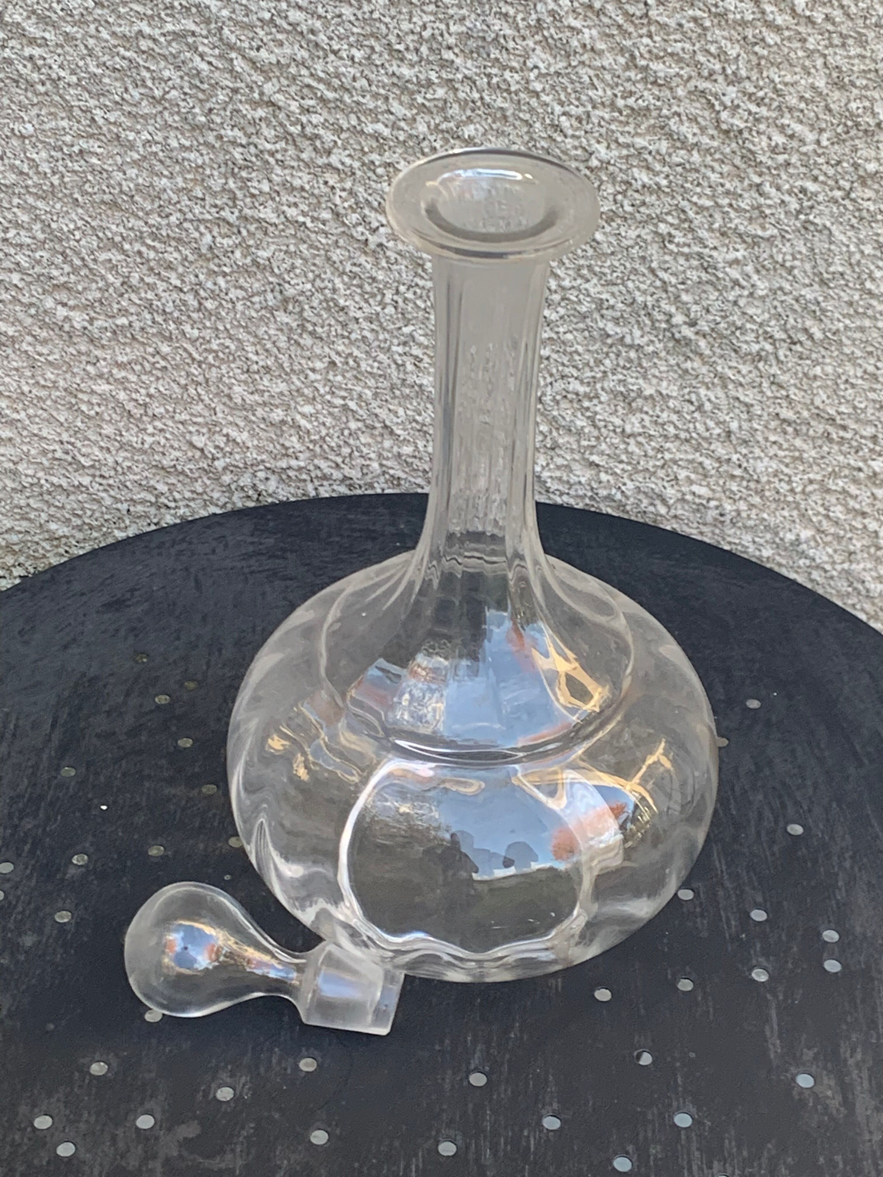 Elegant and vintage transparent glass wine decanter