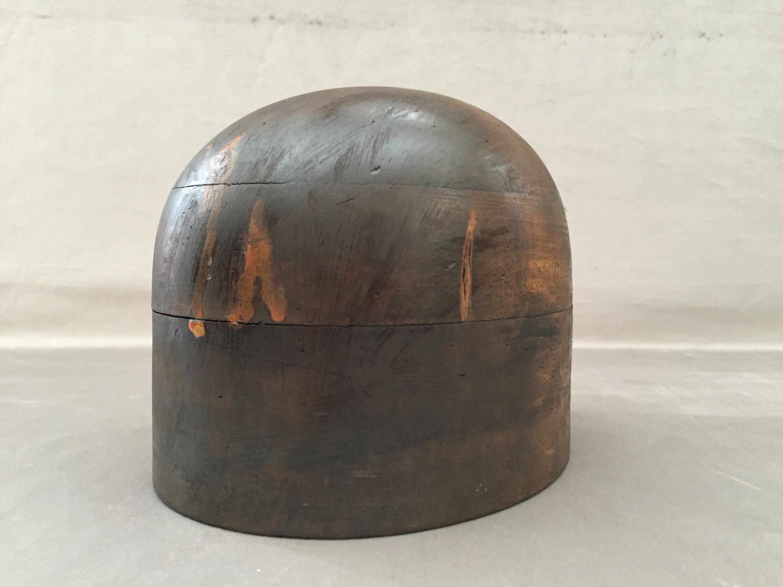 Old head with a wooden marotte hat 1950