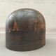 Old head with a wooden marotte hat 1950