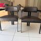 Set of 2 black leather and metal armchairs