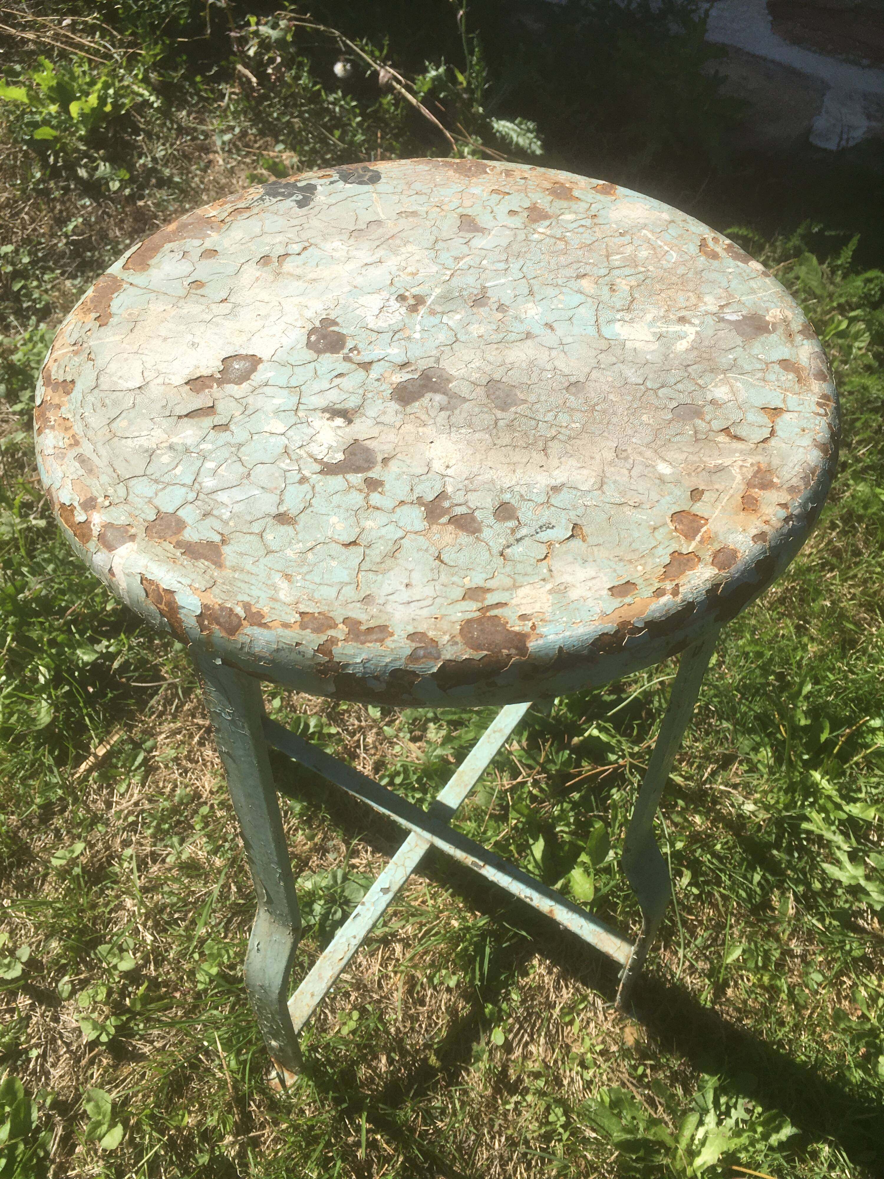Patinated metal industrial stool