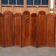 Art Deco screen with 7 panels carved with the insignia of the Foreign Legion, circa 1940