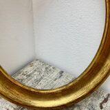Old oval shaped wooden frame