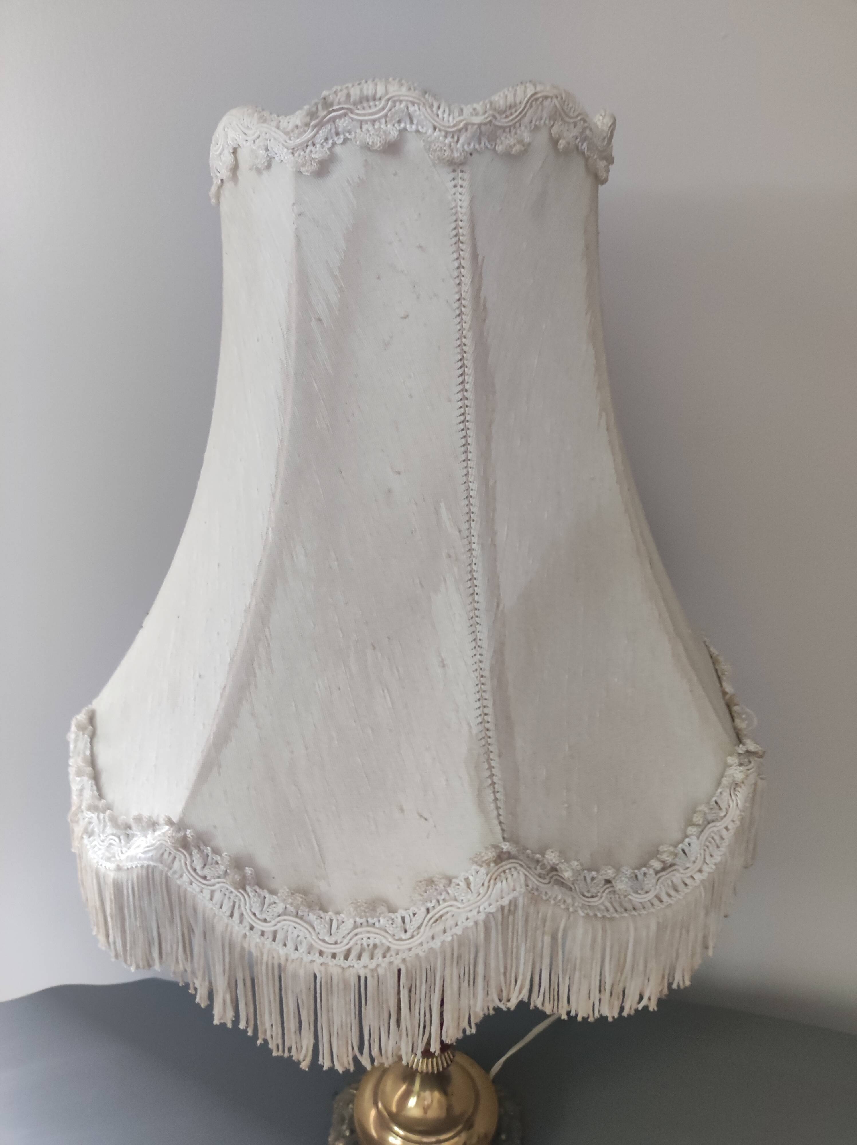 Chiseled bronze foot lamp