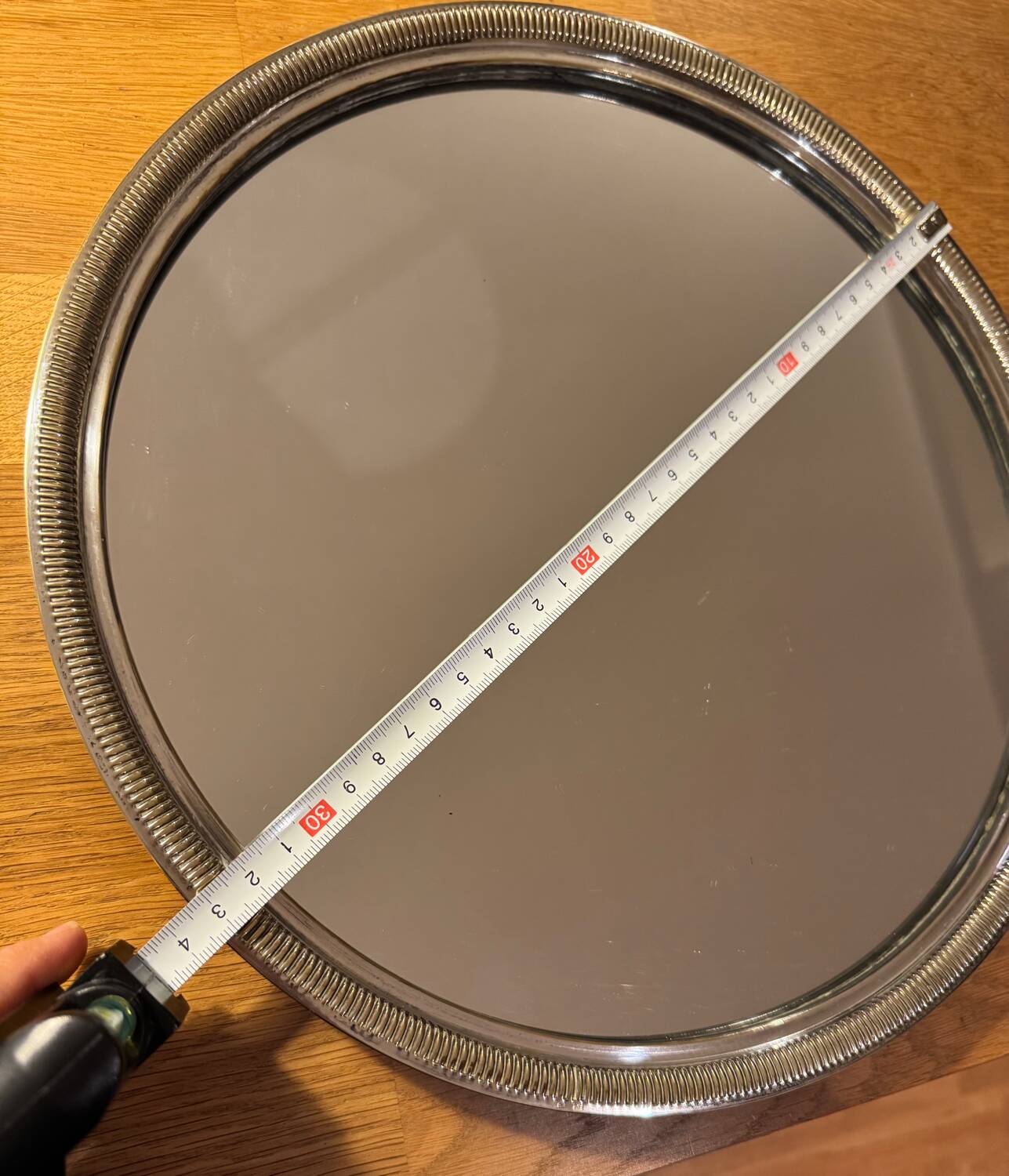 Round silver-plated metal tray and mirror