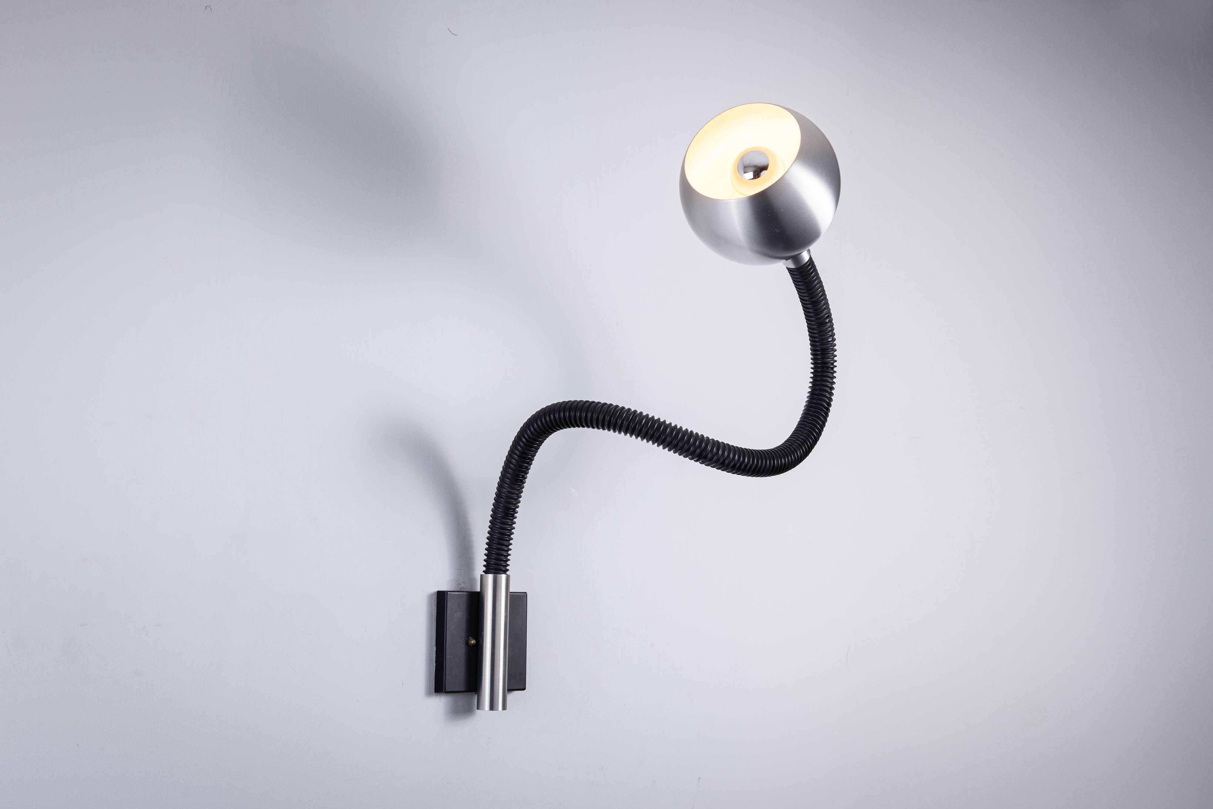 Martine Le Forestier ‘‘Serpent’’ wall lamp for Raak Amsterdam 1968