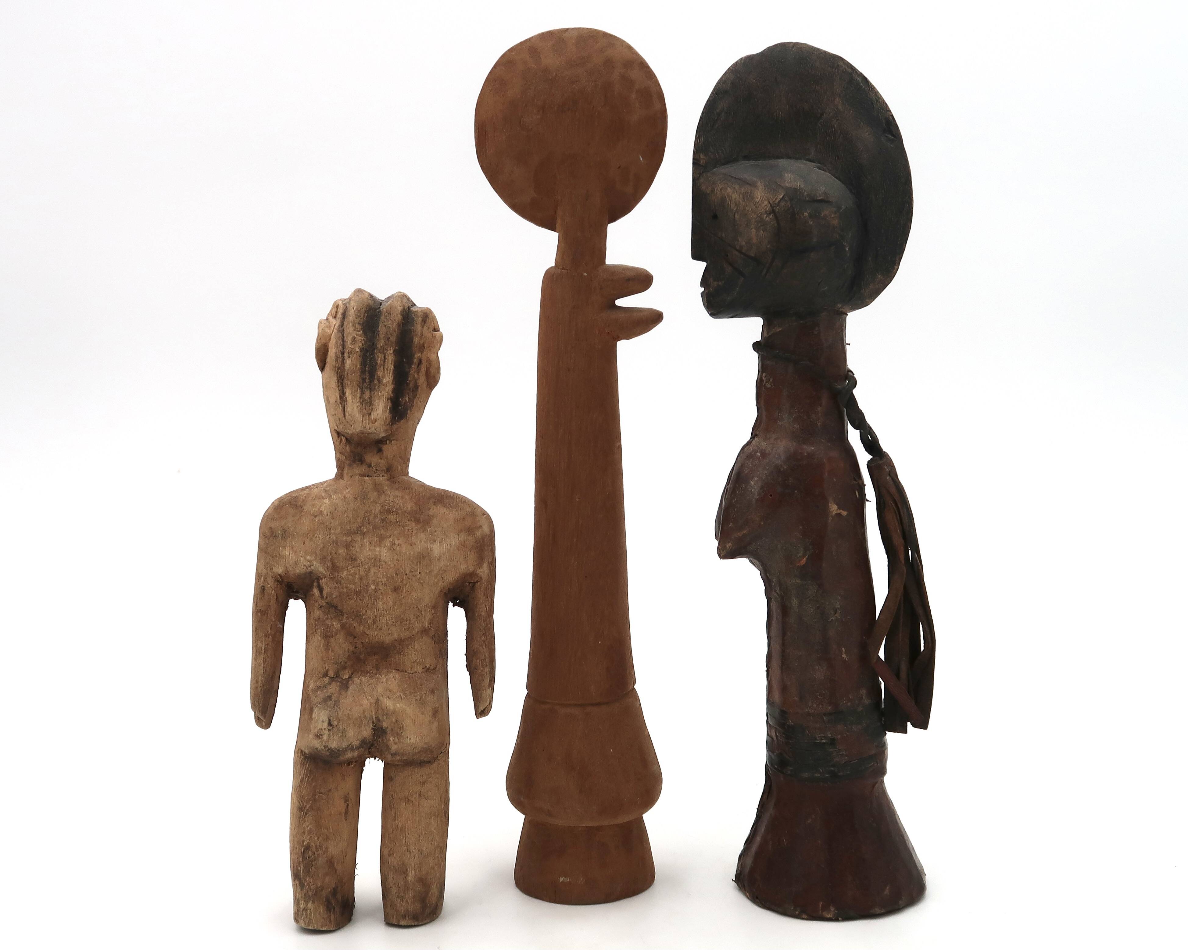 Set of three wooden tribal art statuettes, 1980s