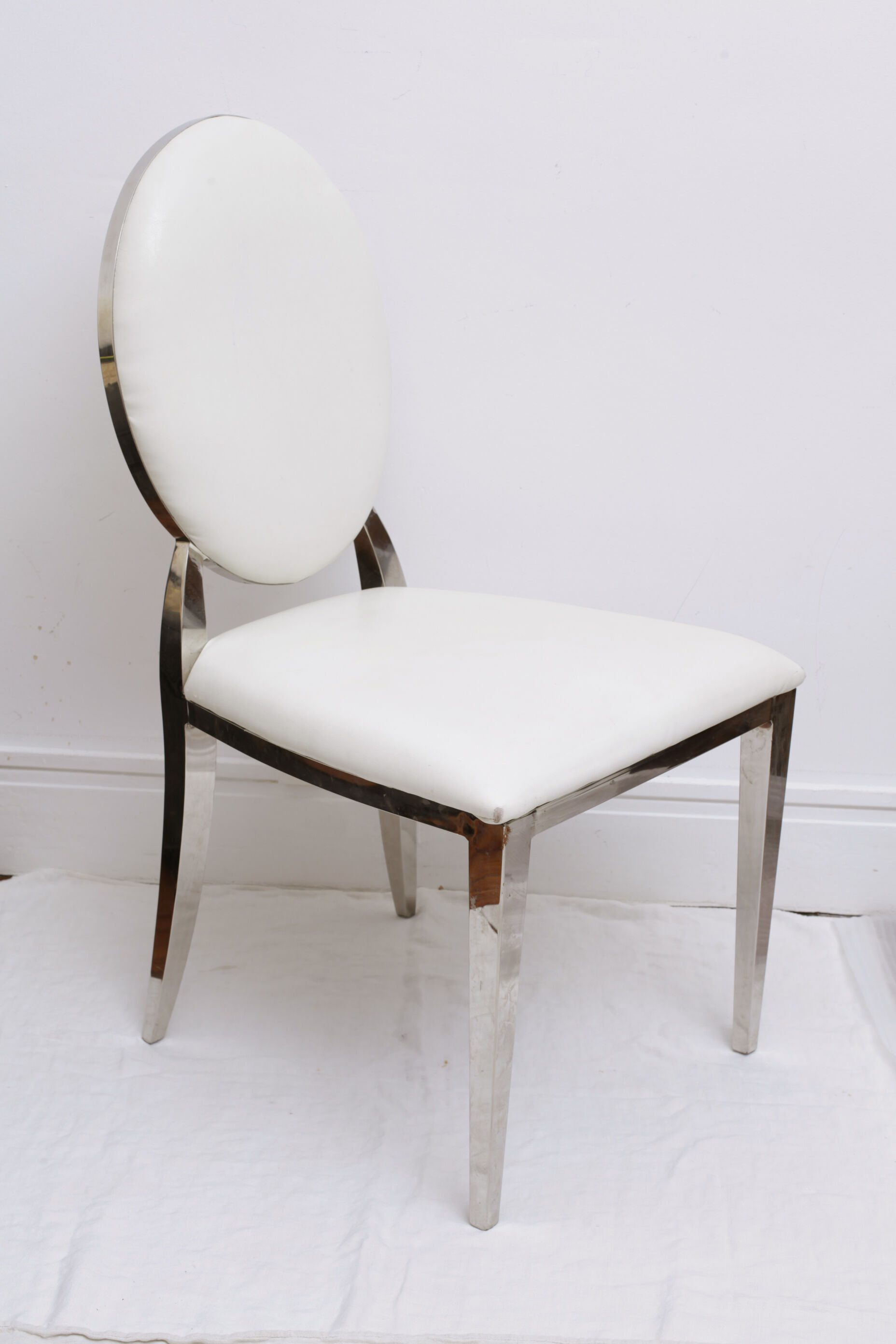 White skai chair and chrome legs