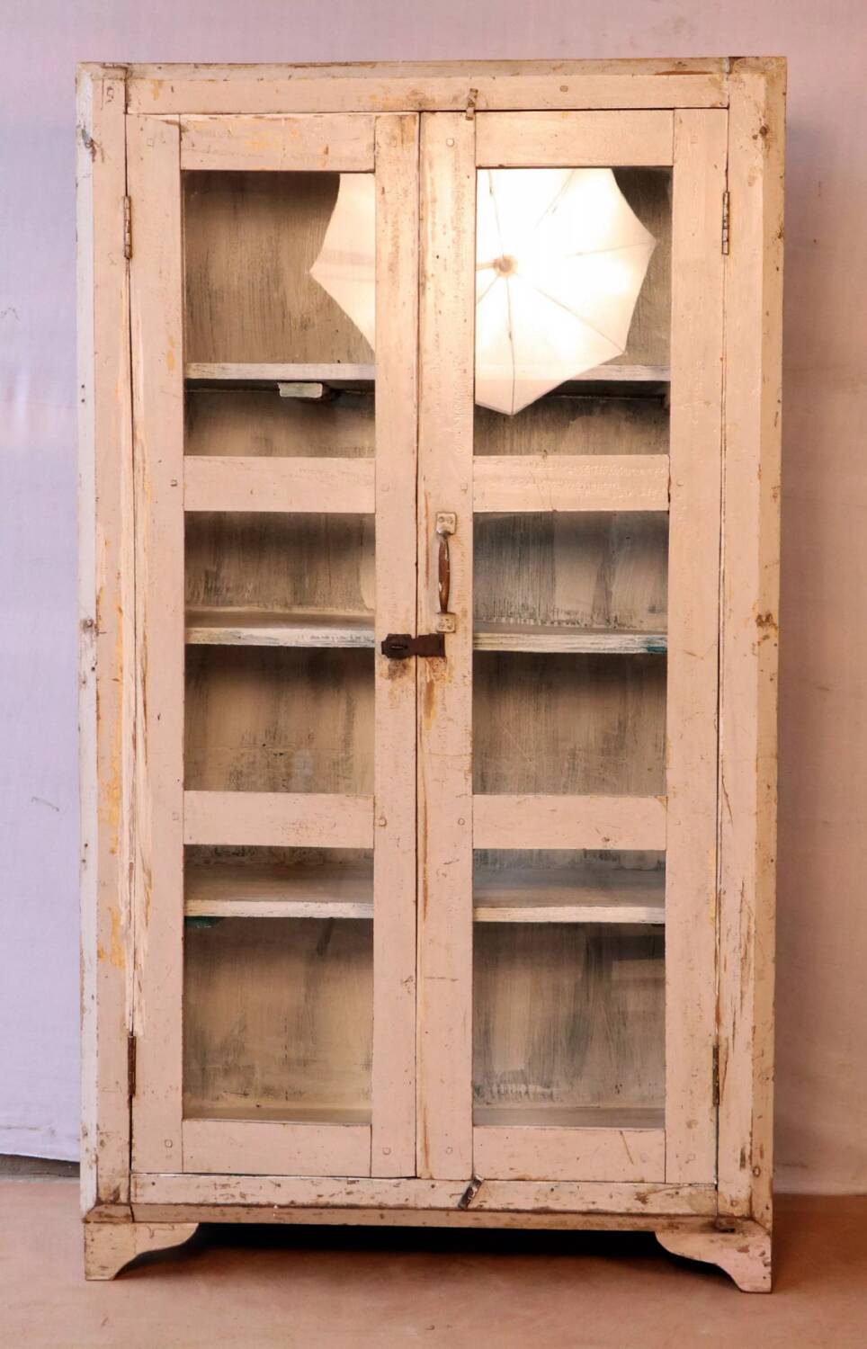 Antique display cabinet in bleached cream teak from Burma.