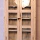 Antique display cabinet in bleached cream teak from Burma.