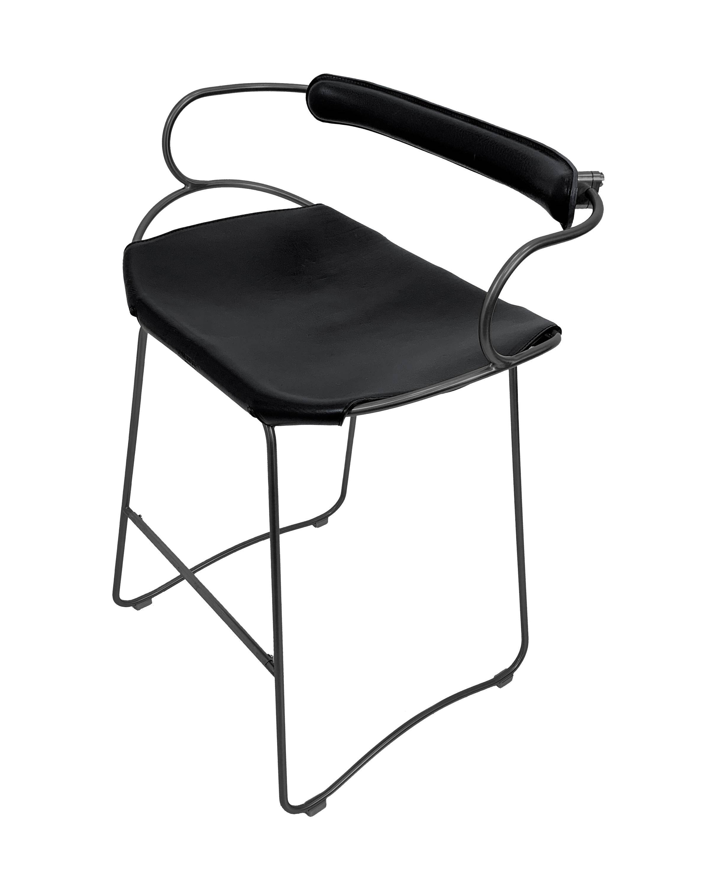Contemporary sculptural bar stool c. Black smoked metal backrest and black leather.