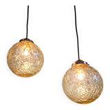 Pair of amber bubble glass pendant lights, 1970s