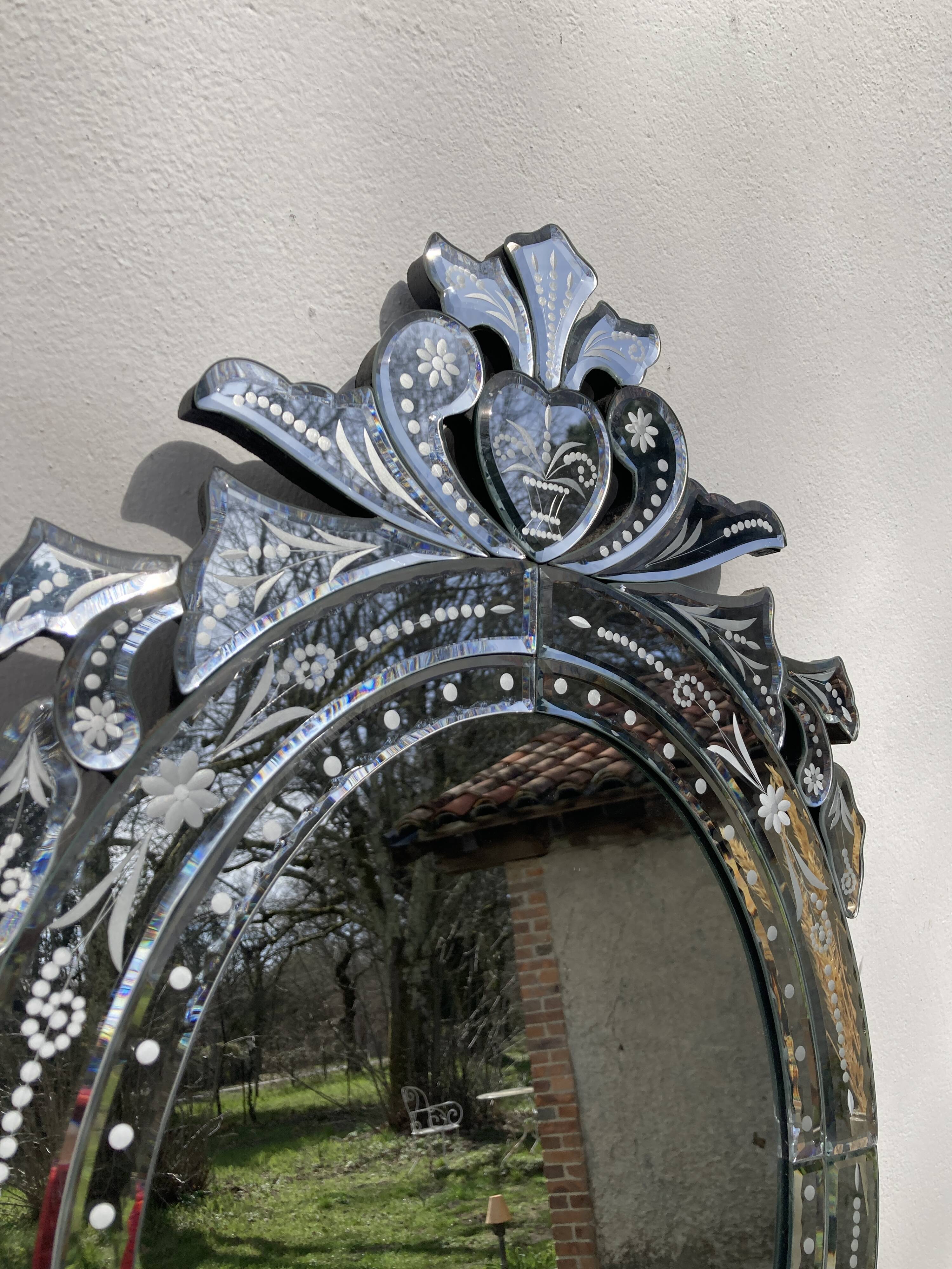 Oval Venetian wall mirror