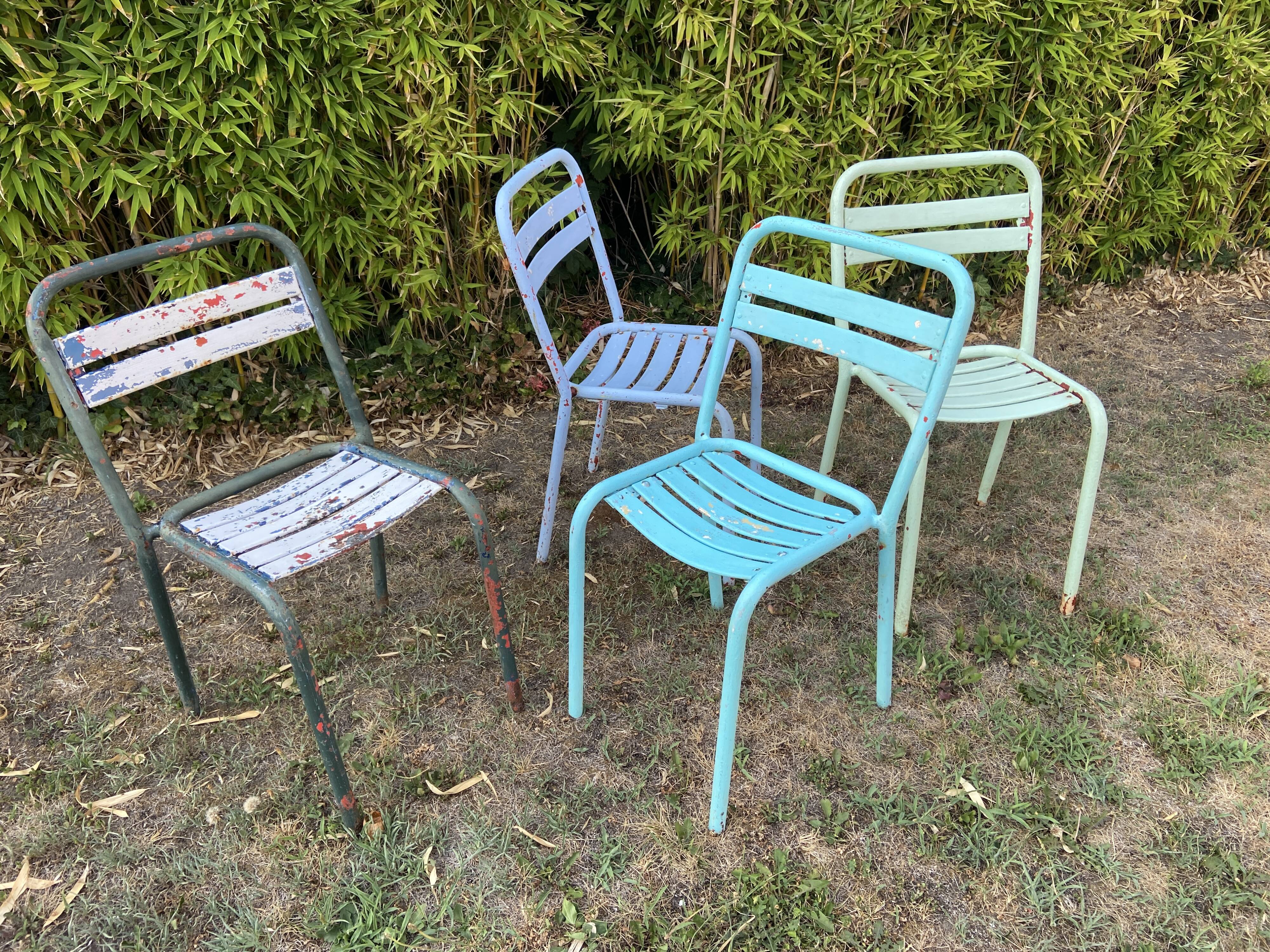 4 mismatched chairs Tolix brasserie bistro terrace French bistro 60s