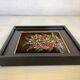 Small painting of a bouquet of flowers signed
