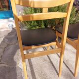 5 Scandinavian style chairs, wood and black faux leather.