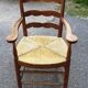 Rustic straw armchair
