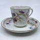Porcelain tea service with floral and butterfly decorations, 25 pieces.