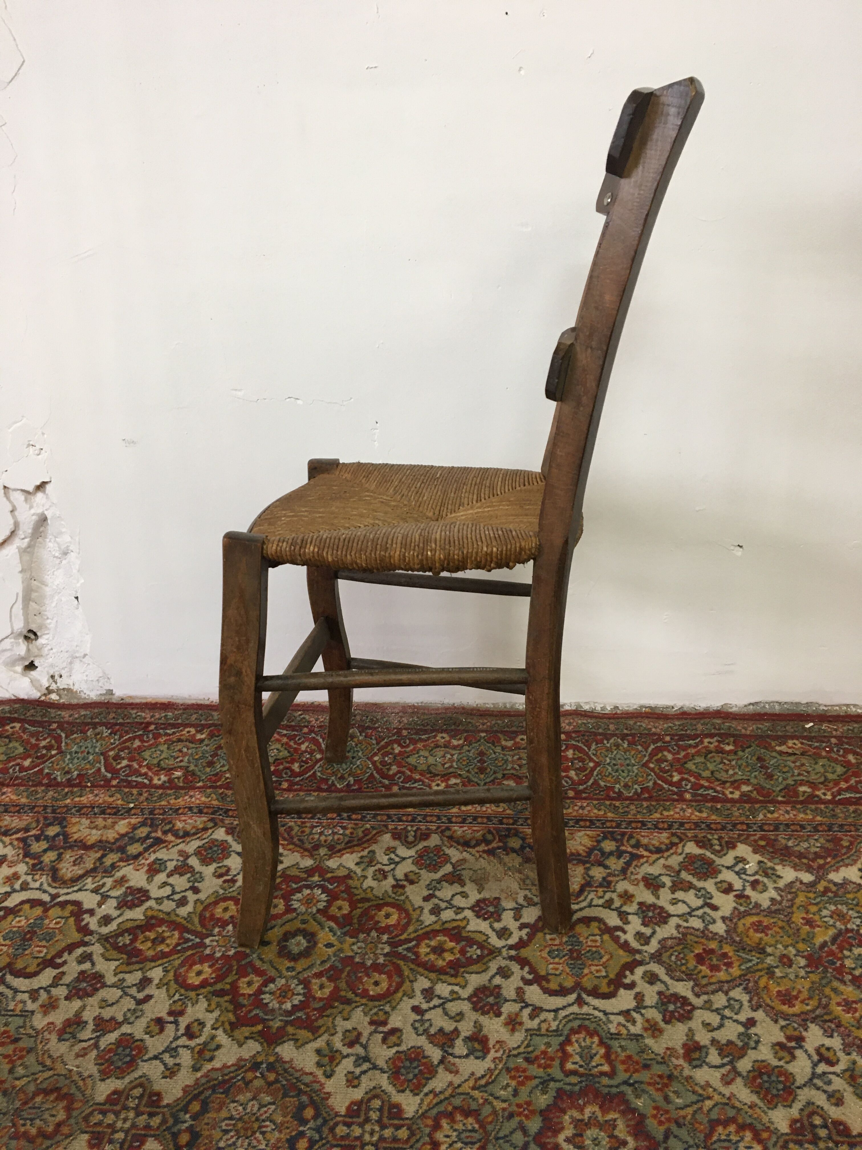 Old wood and straw chair