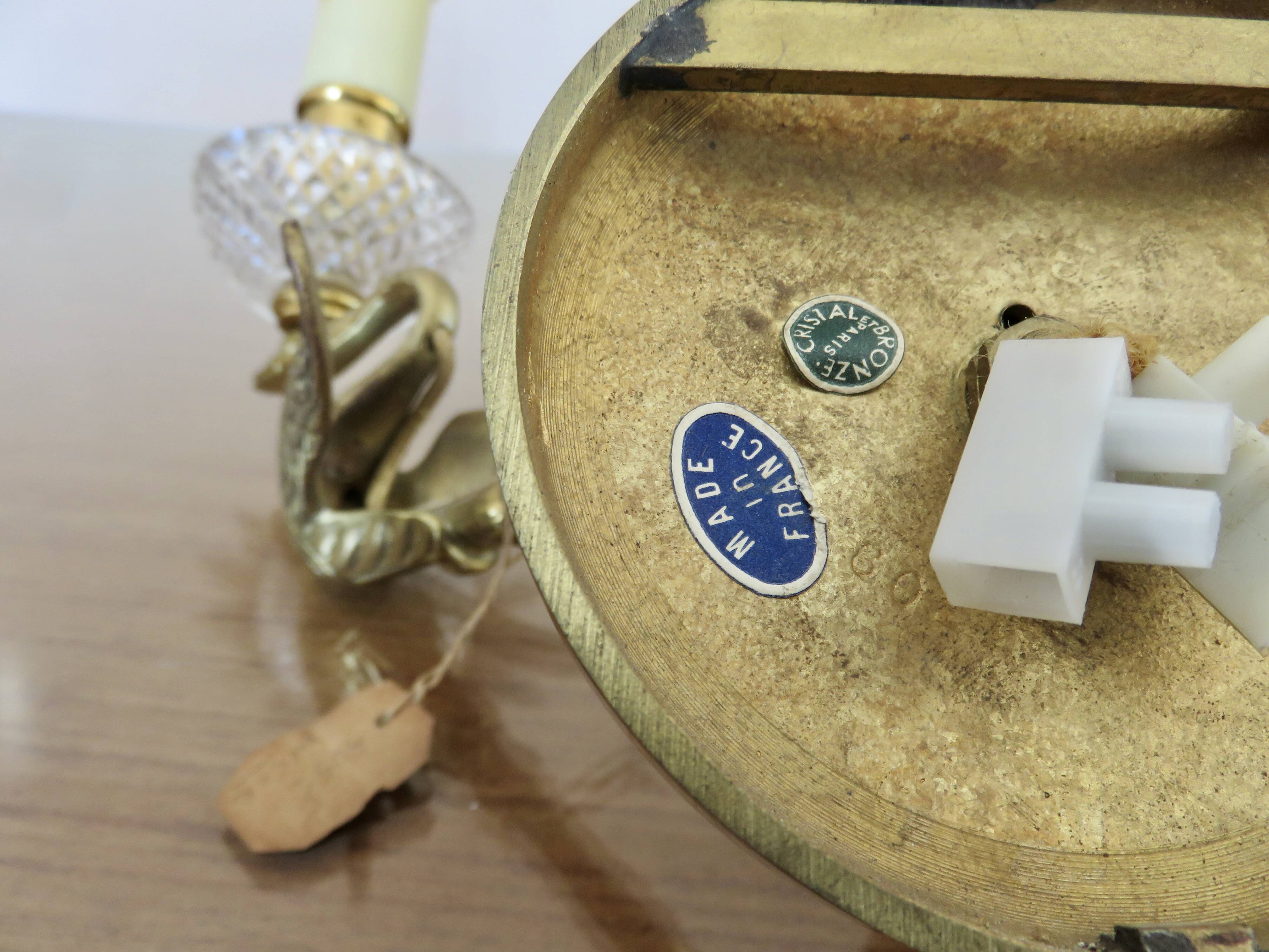 Pair of Lucien Gau "swan" wall lights in gilded bronze with bright gold and crystal