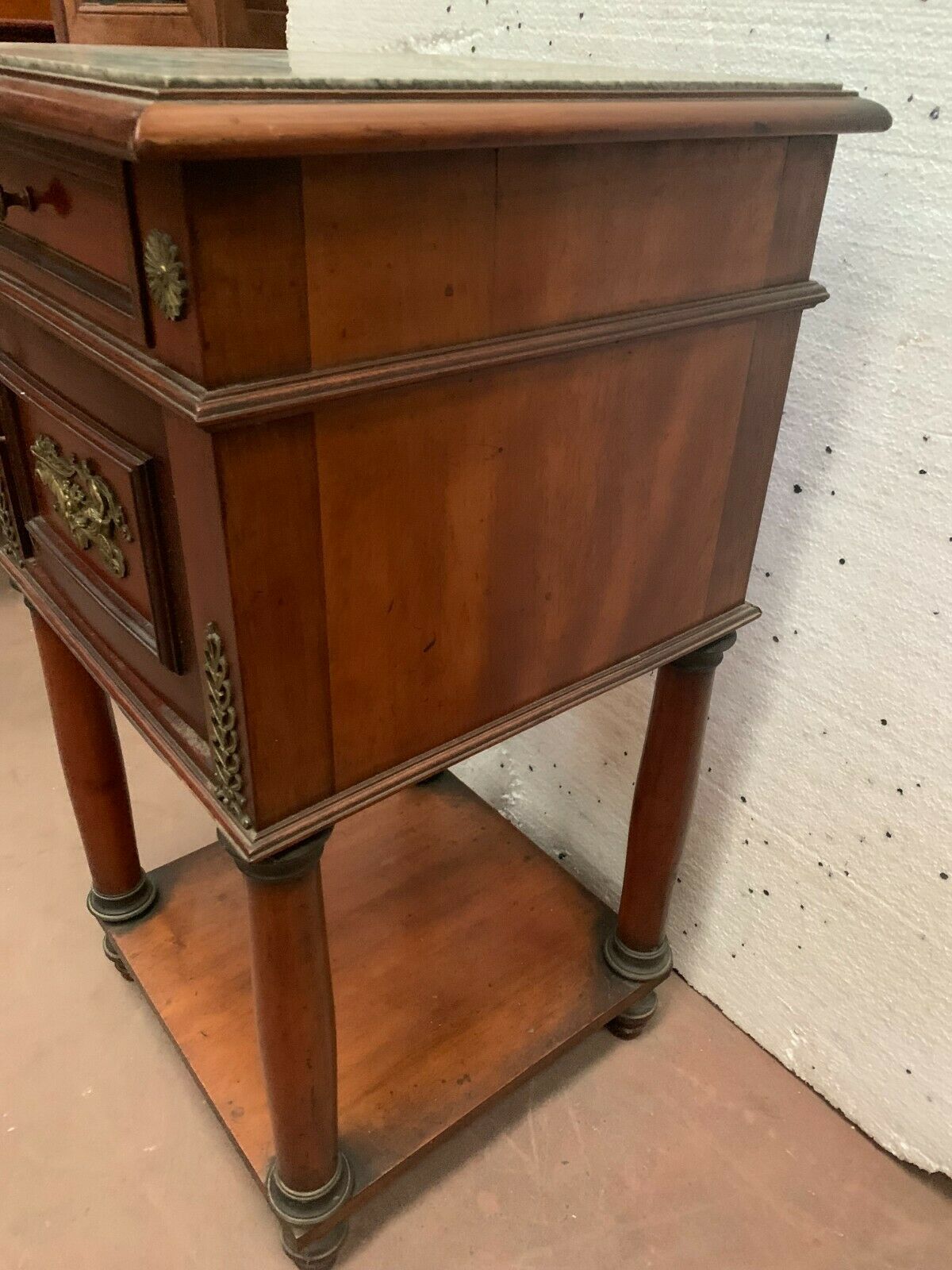 Empire style mahogany bedside table