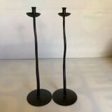 Pair of black hysteria-style candlesticks