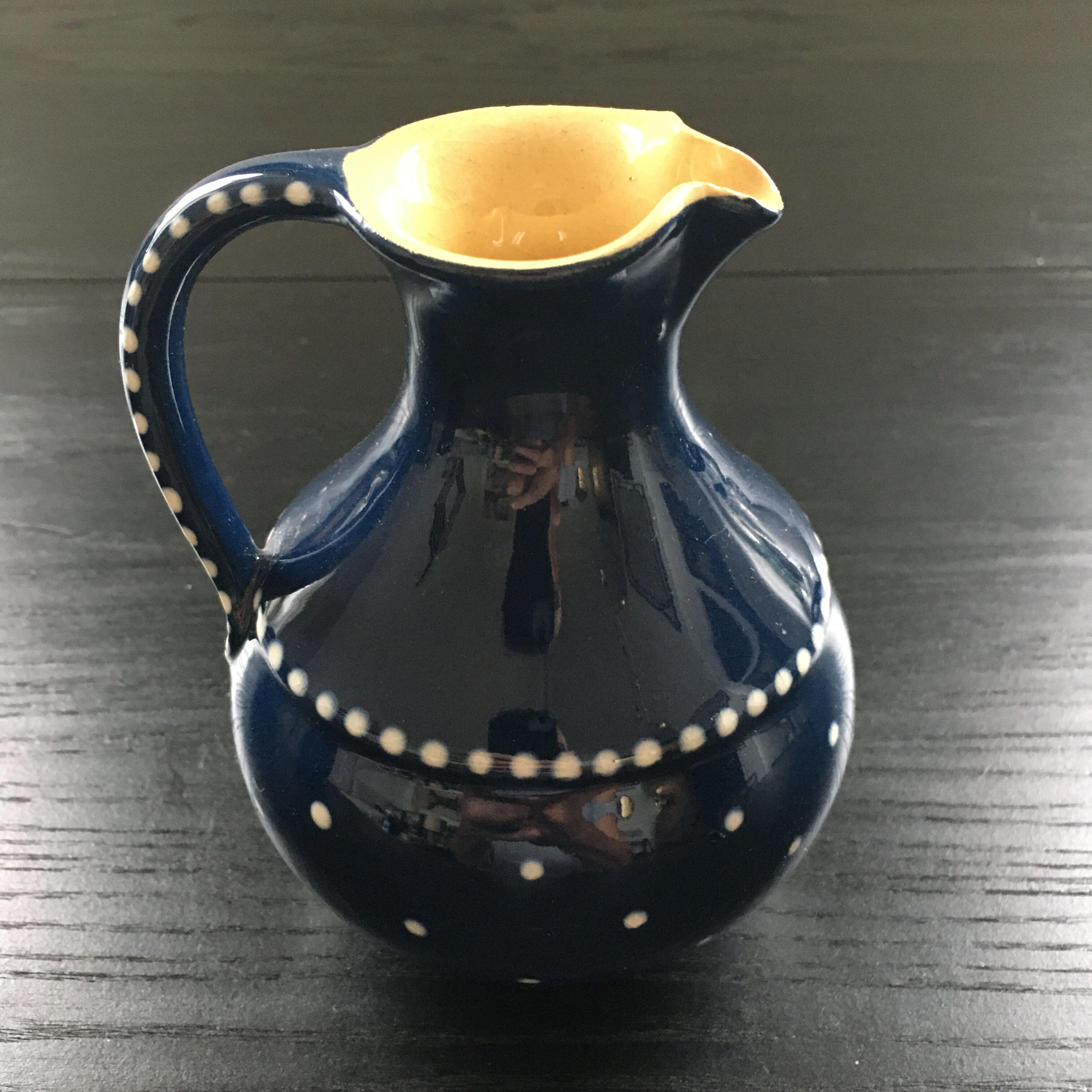 Midnight blue pitcher décor white polka dots