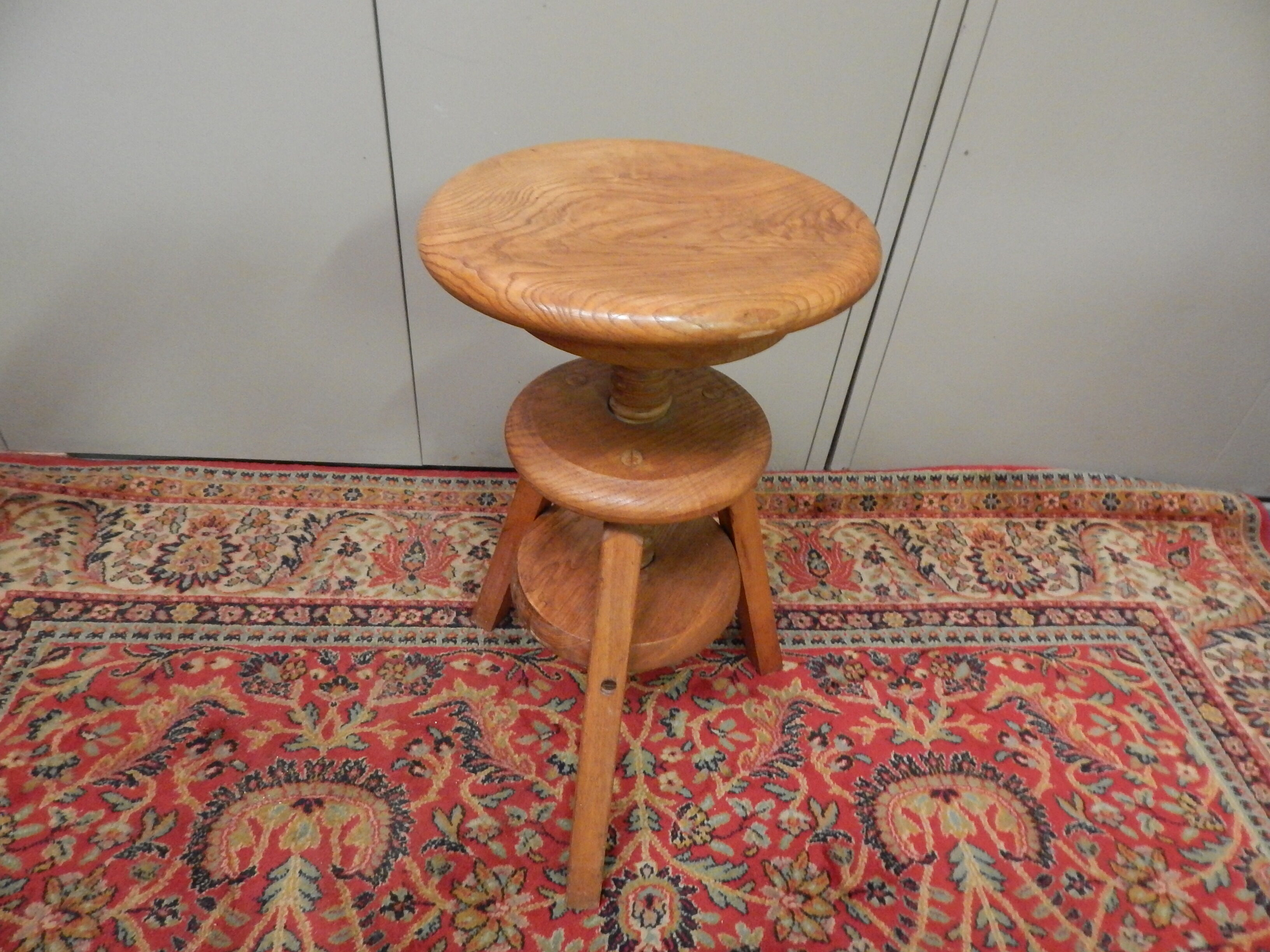 Stool has tripod screw 50 years