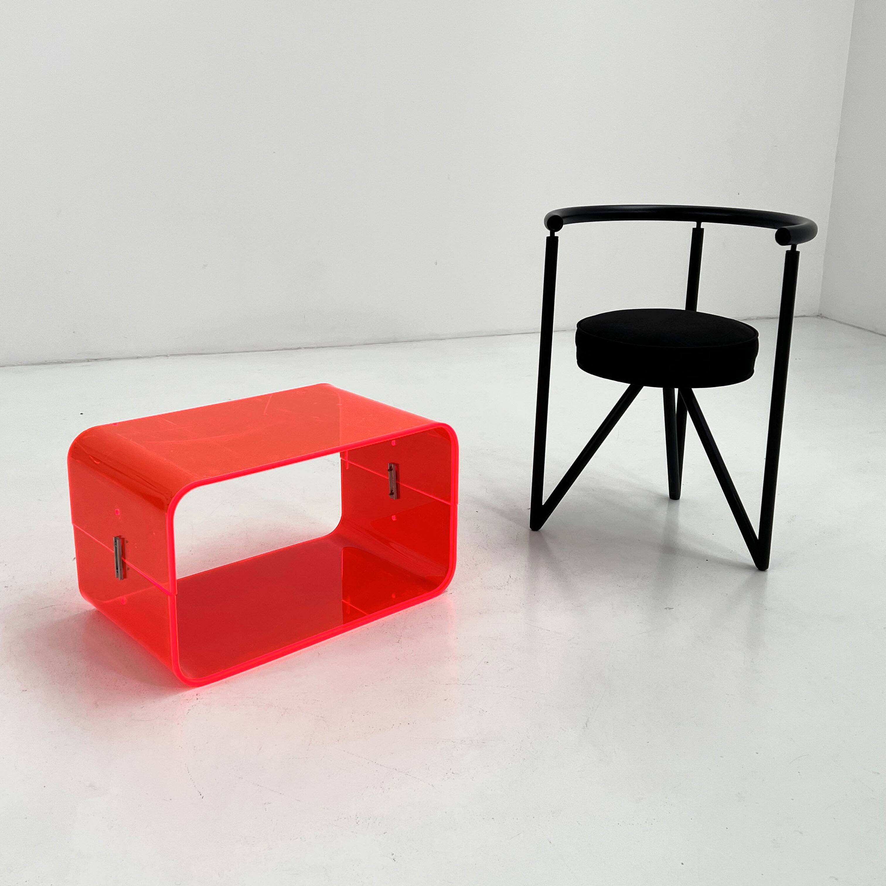 Fluorescent pink plexiglass coffee table, 1980.