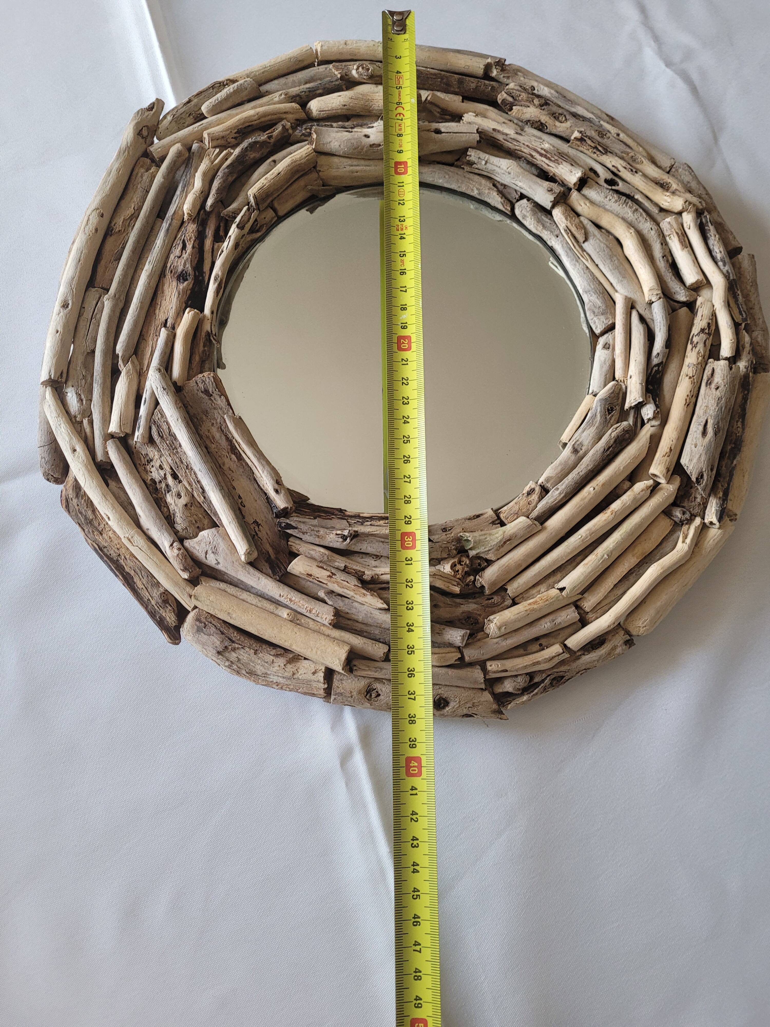 Very nice driftwood mirror.