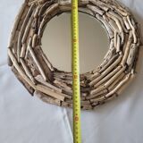 Très joli miroir en bois flotté.