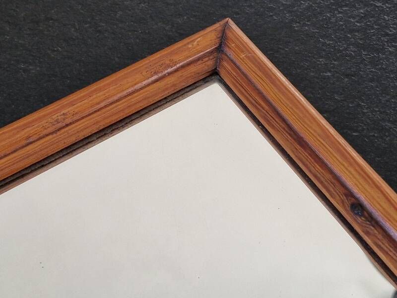 Carved wooden mirror from the Napoleonic III era in fir or pine from the 19th century.