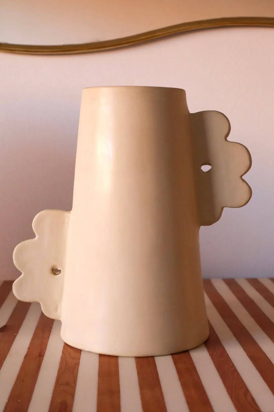 Abstract handmade ceramic vase with off-white matte floral design - daisy