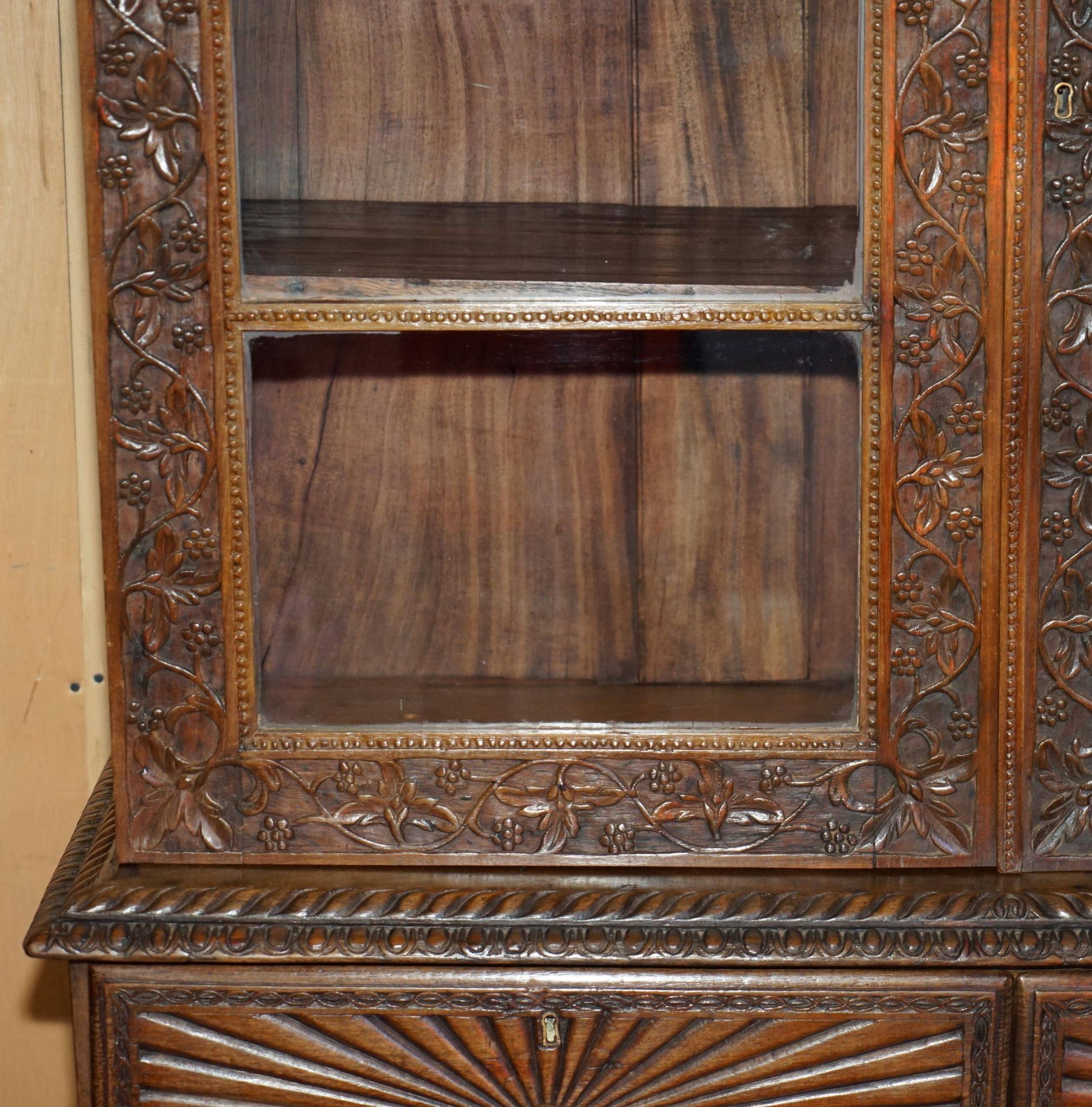 19th-century Anglo-Indian colonial hardwood library on a chest of drawers.