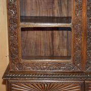 19th-century Anglo-Indian colonial hardwood library on a chest of drawers.