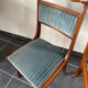 Classic wooden chair with blue fabric seat and back